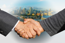 business handshake city